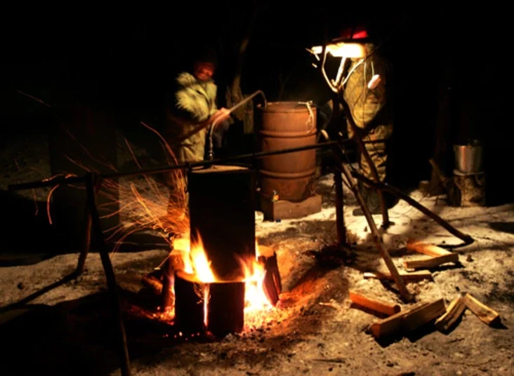 A villager produces moonshine vodka. Photo by Julia Darashkevich