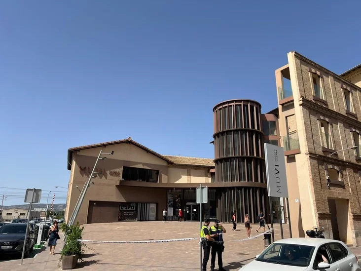 A policeman stood on the road outside the Museum of Villena, which is cordoned off with police tape